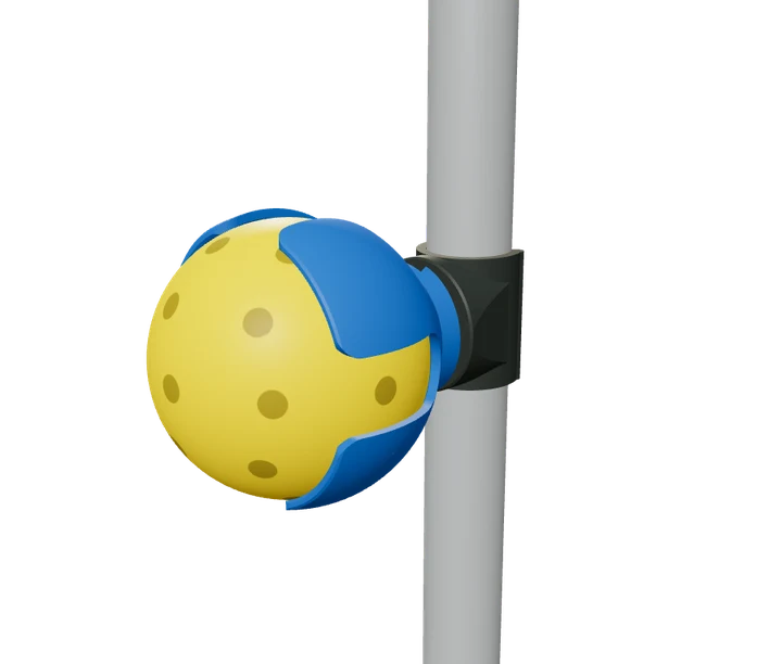 A pickleball snapped into the cup